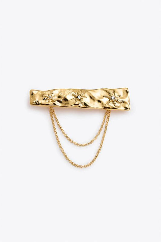 Broche Triada
